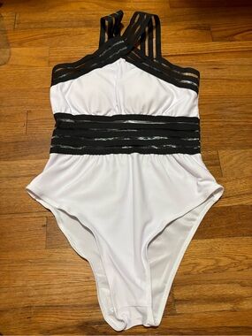 White One-Piece Swimsuit with Black Strappy Accents